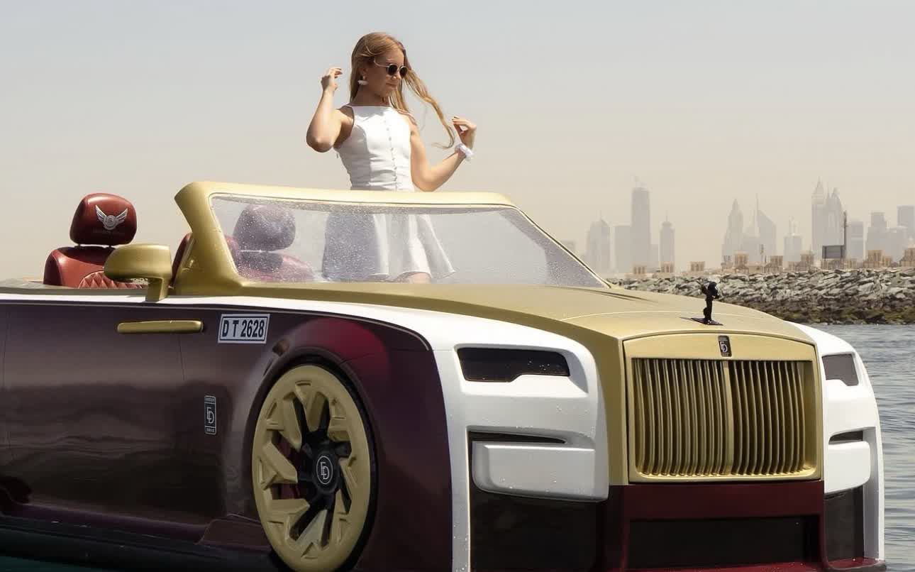 Bespoke jetcar moored on calm water against a city skyline